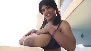 A couple of massive breasts offered to play with by an ebony